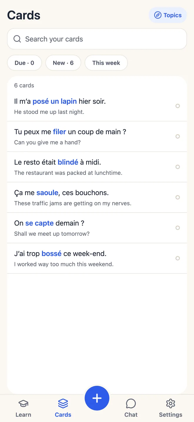 Cards: a searchable list of saved phrases with their translations.